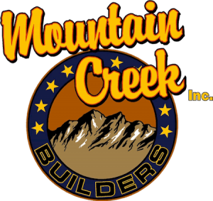 Mountain Creek Builders Logo-yellow, orange, brown, blue circle with a mountain in the middle with the word builders and stares around the circle